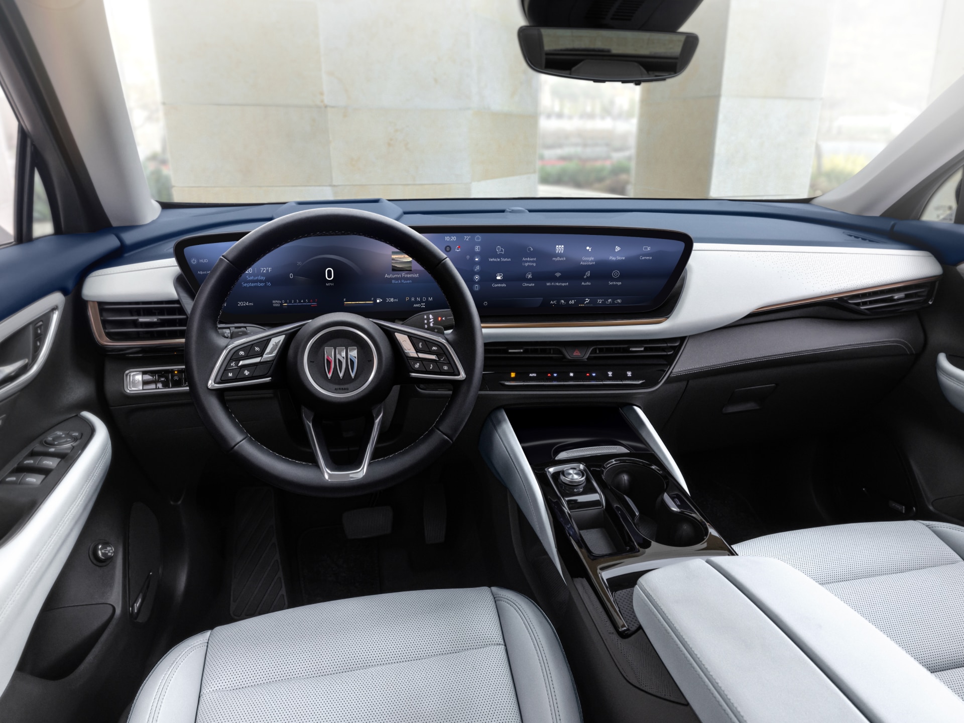 The Sleek Interior Dashboard of a Buick Envision, Featuring Digital Displays and a Minimalist Design