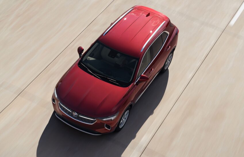 Overhead View of a Red Buick Driving On-Road During the Day
