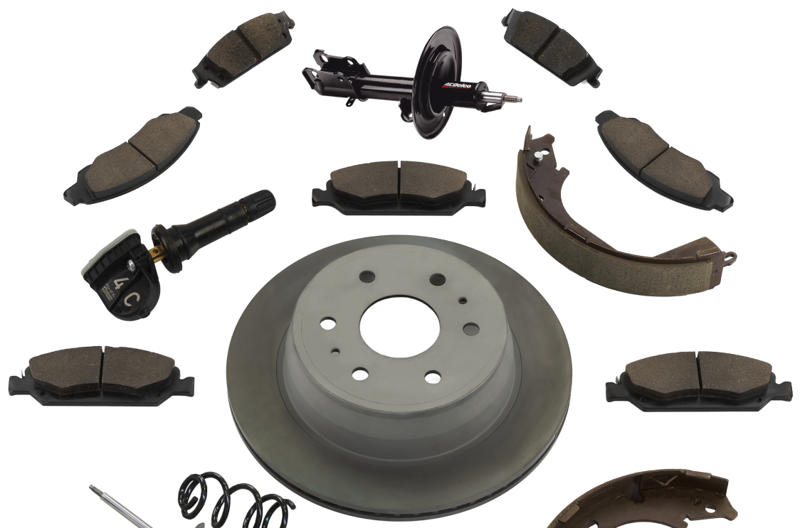 Brake Parts and Accessories Laid Out Against a White Background