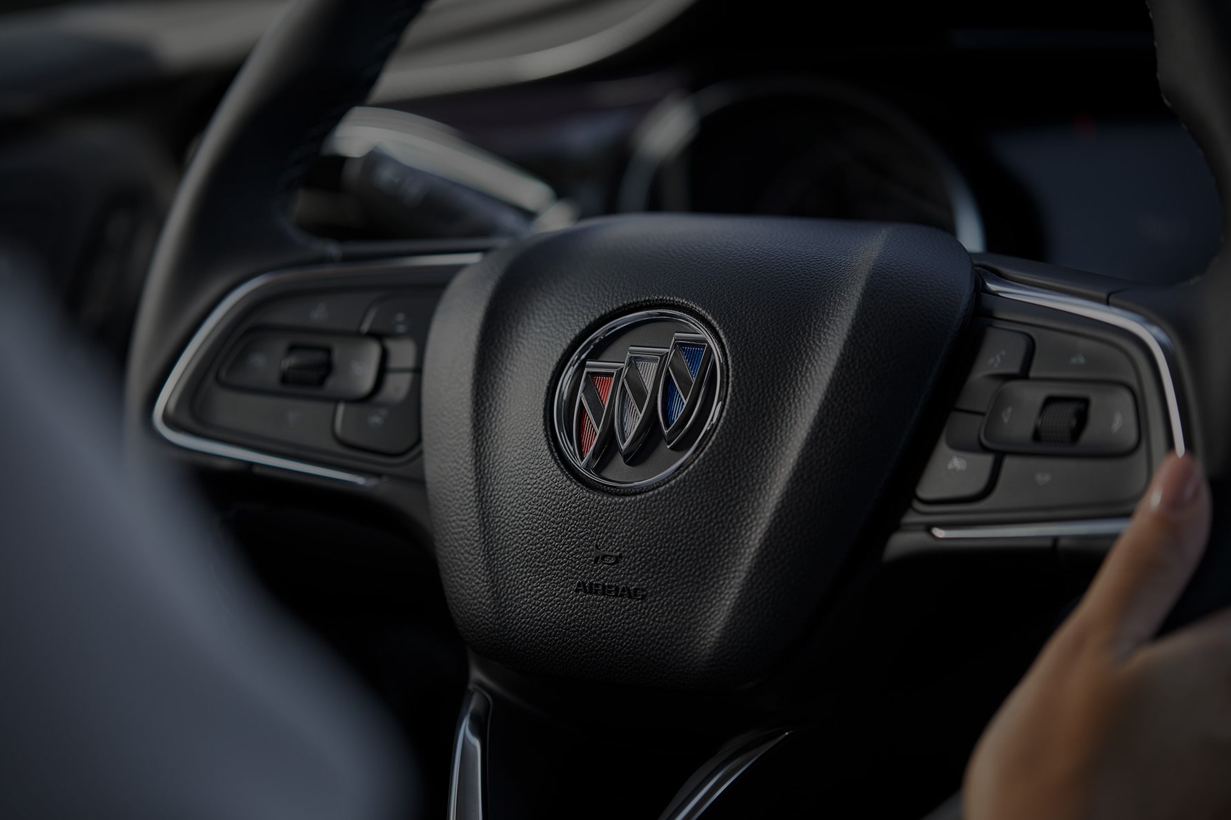 A Close Up of a Black Buick Steering Wheel