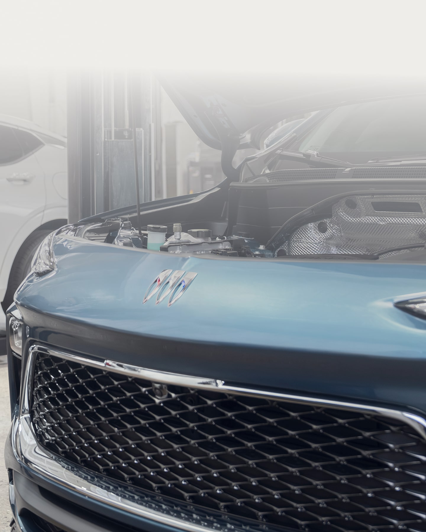 A Front Side View of a Grill of a Buick Vehicle