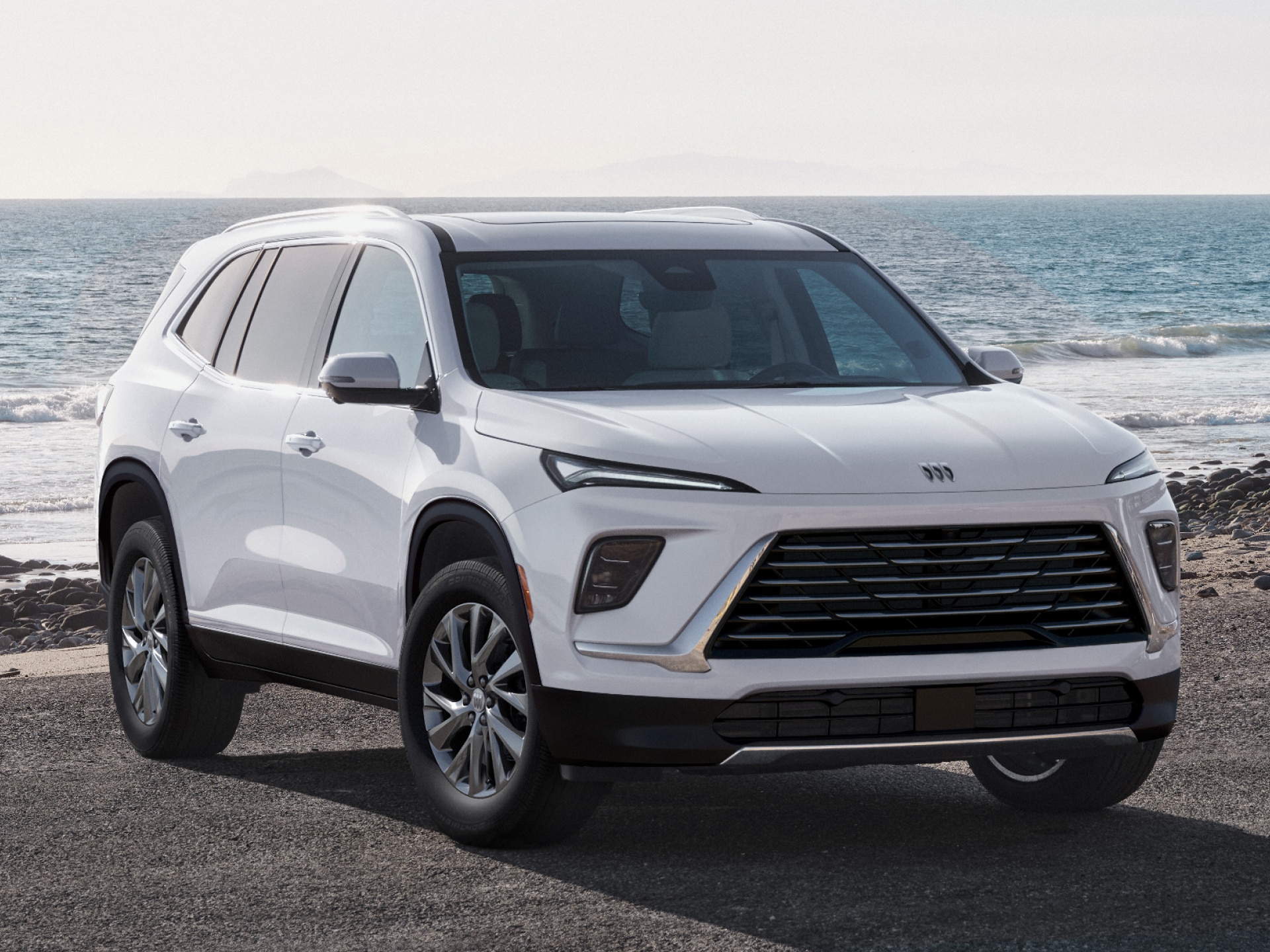 Front Three-Quarters View of the Buick Enclave Parked on a Beach