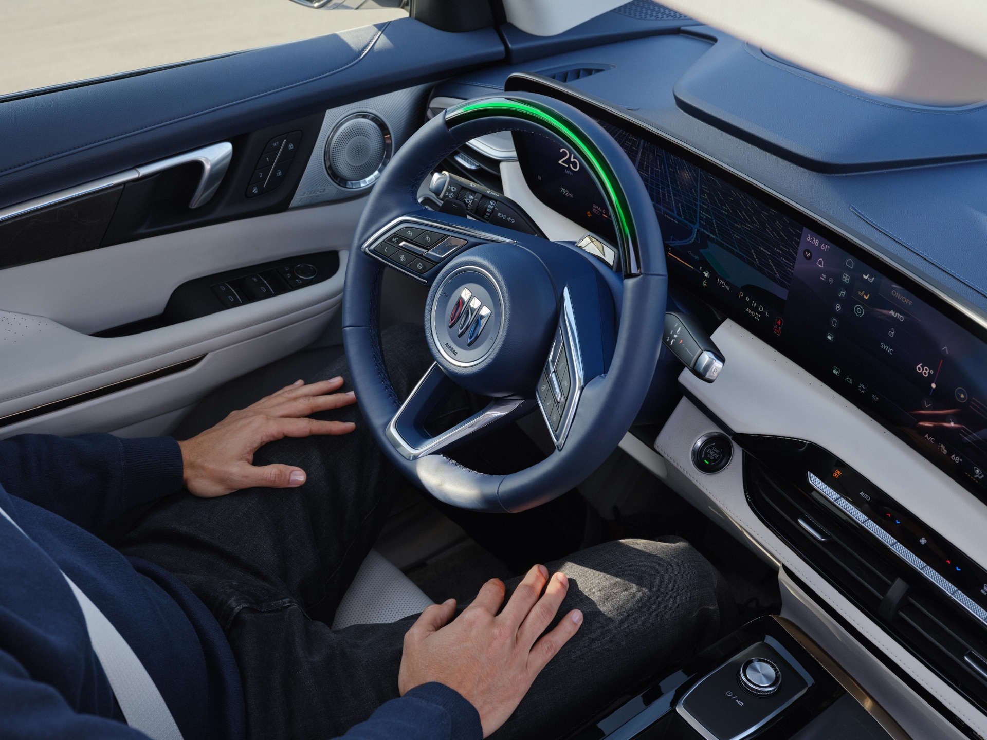 A Man Using the Super Cruise Hands-Free Driver Assistance Technology in his Buick Enclave