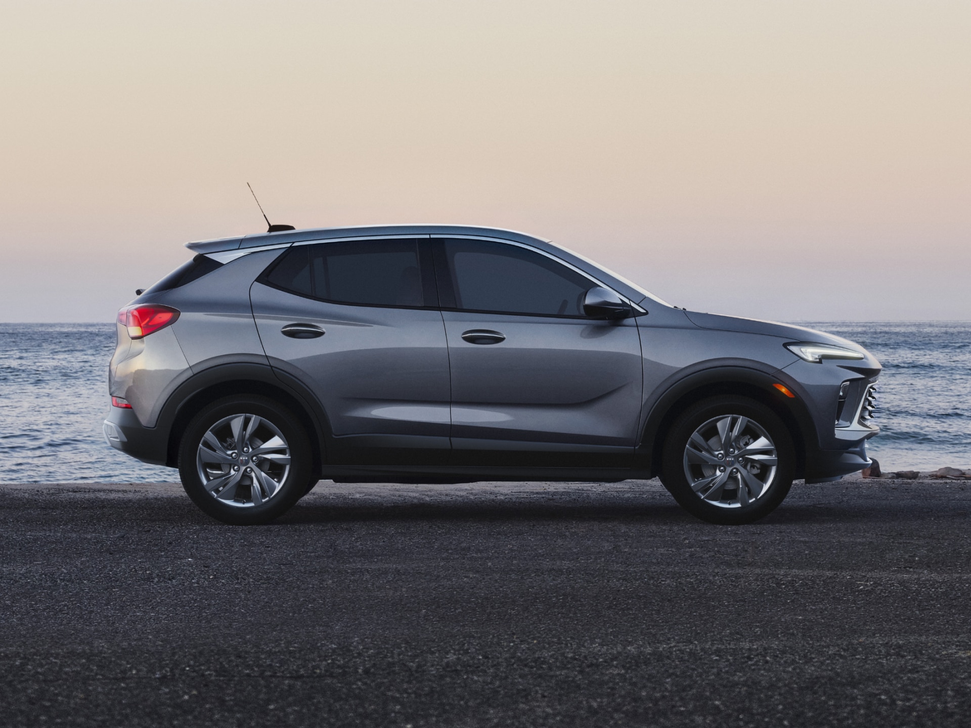 Rear Three-Quarters View of a Buick Encore GX Parked on a Beach