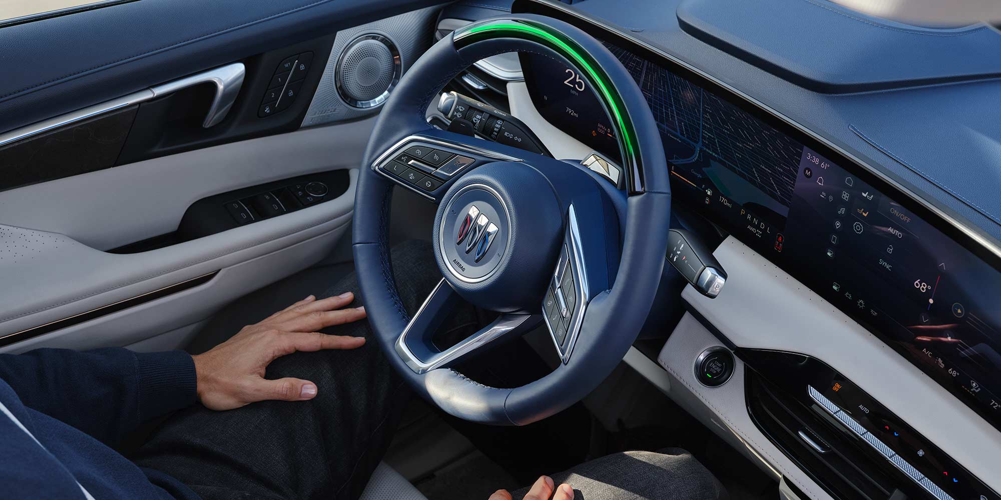 Interior View of the Driver Using Super Cruise Hands-Free Driving Technology in the Buick Enclave