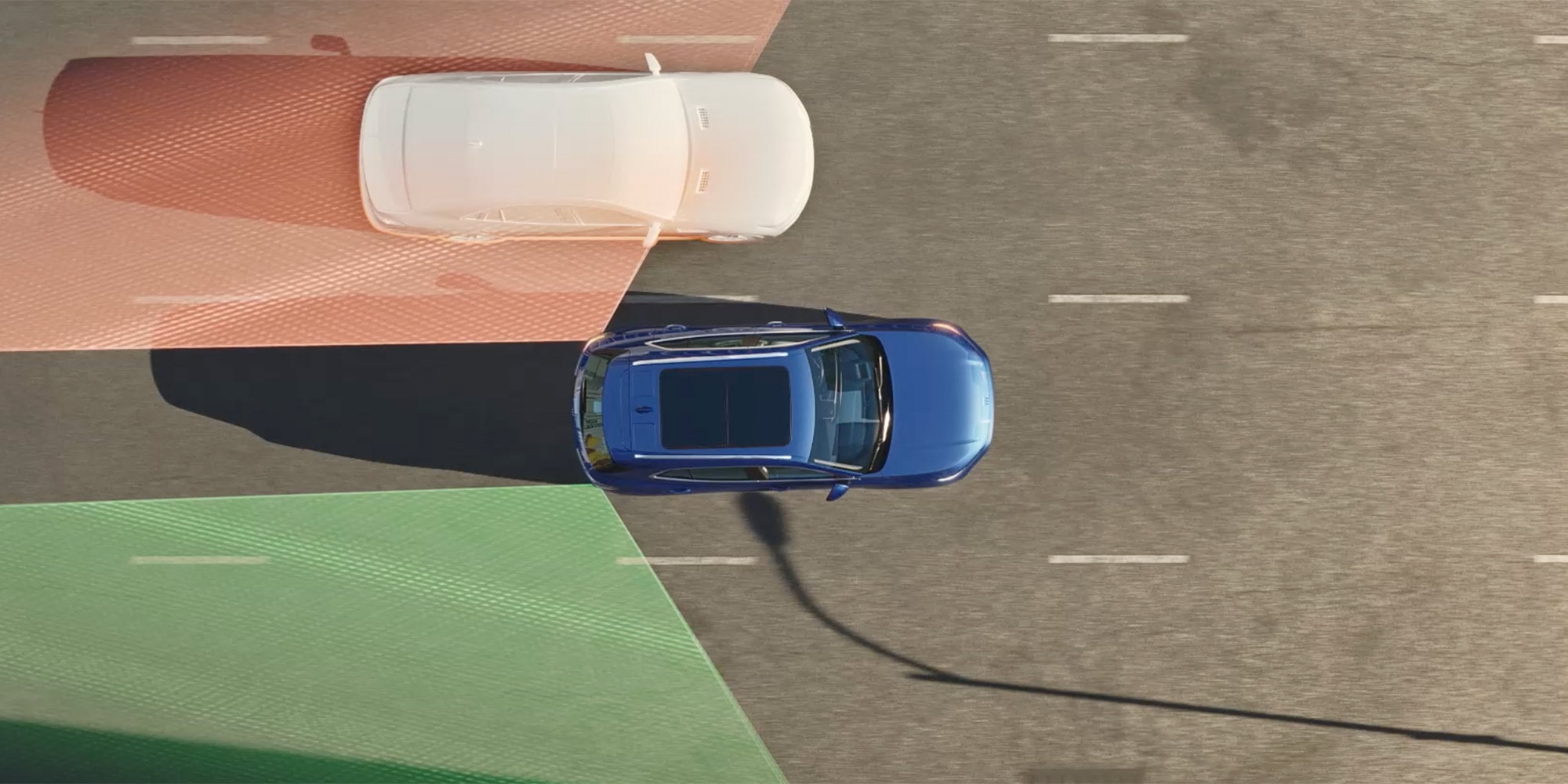 An Overhead View of a Blue Buick Envision with Blind Spot and Steering Assistance Overlays on a Road
