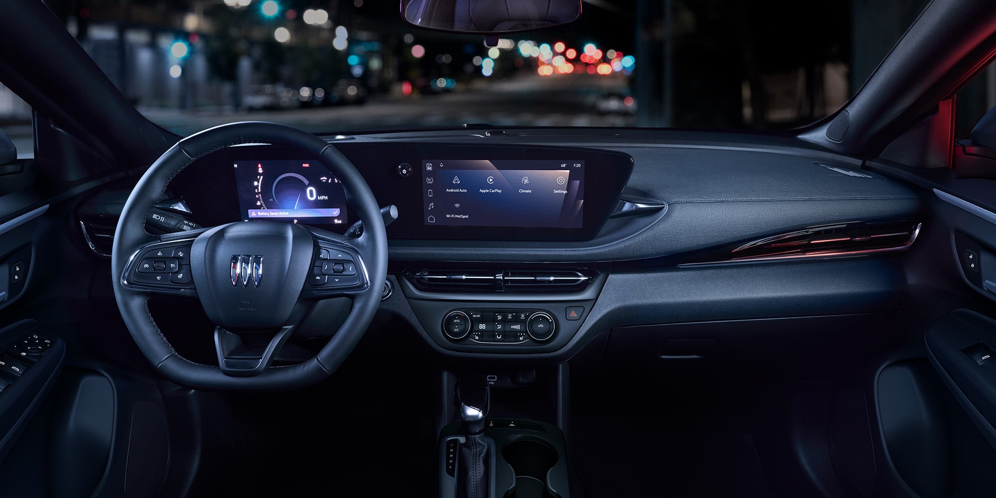 The Interior of a Buick Envista Showing the Steering Wheel and a Large Digital Infotainment Screen