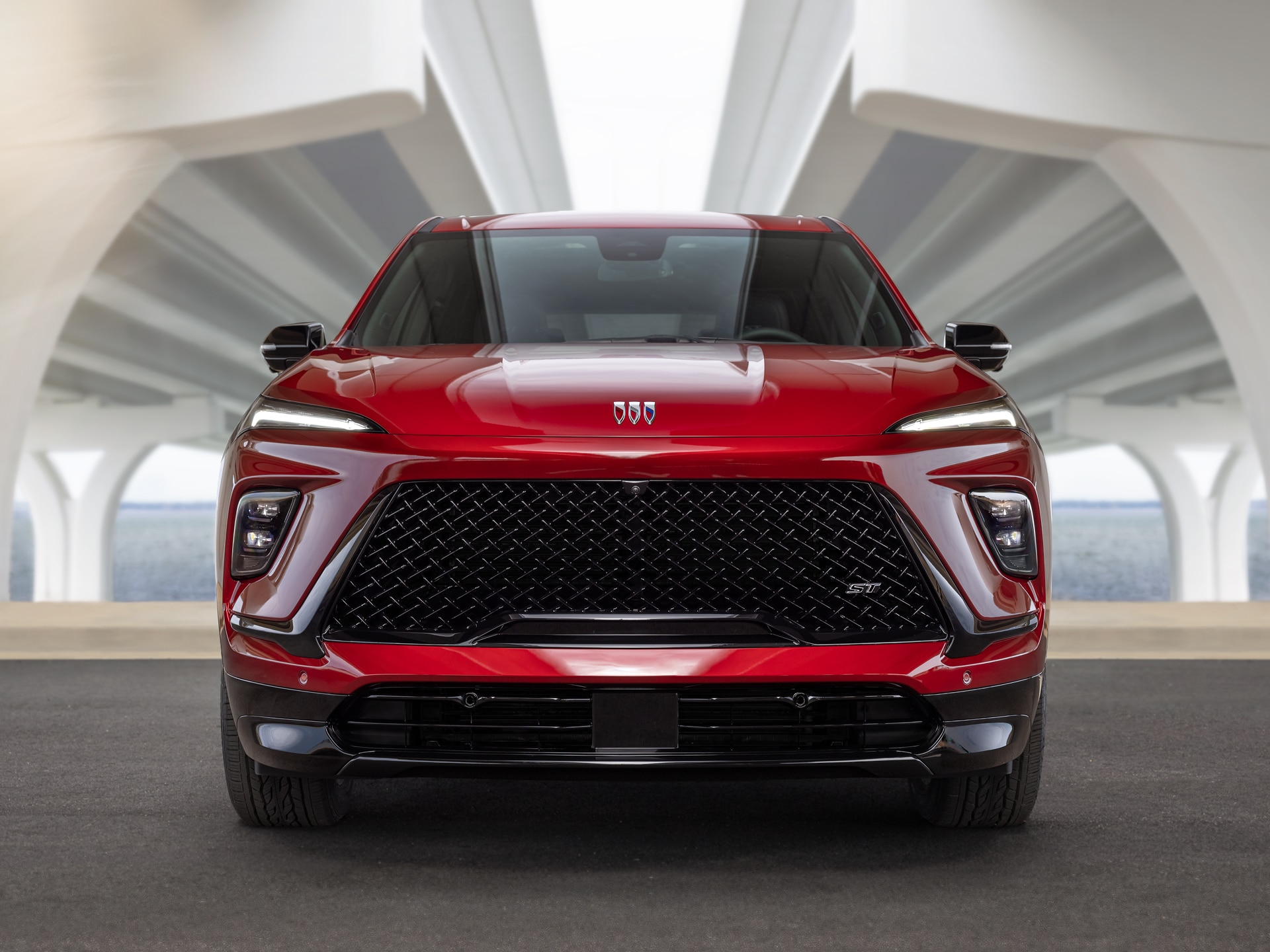 Front View of a Red Buick Enclave Mid-Size SUV