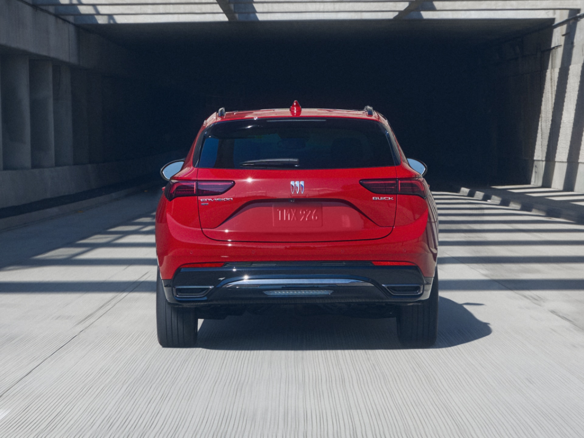 Rear View of the 2026 Buick Envision Compact SUV Driving Down the Freeway