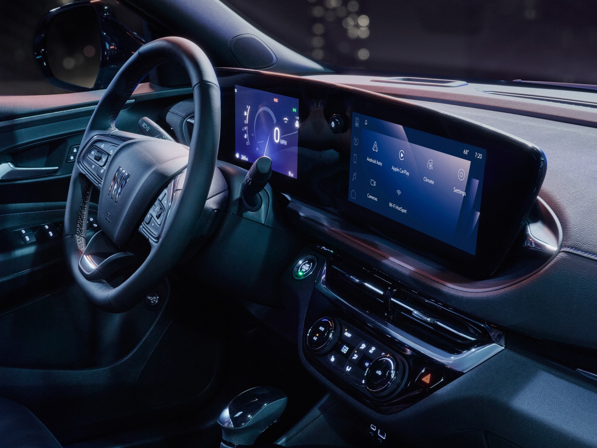 The Interior of a Buick Vehicle Featuring Digital Displays and an Infotainment System with Apps