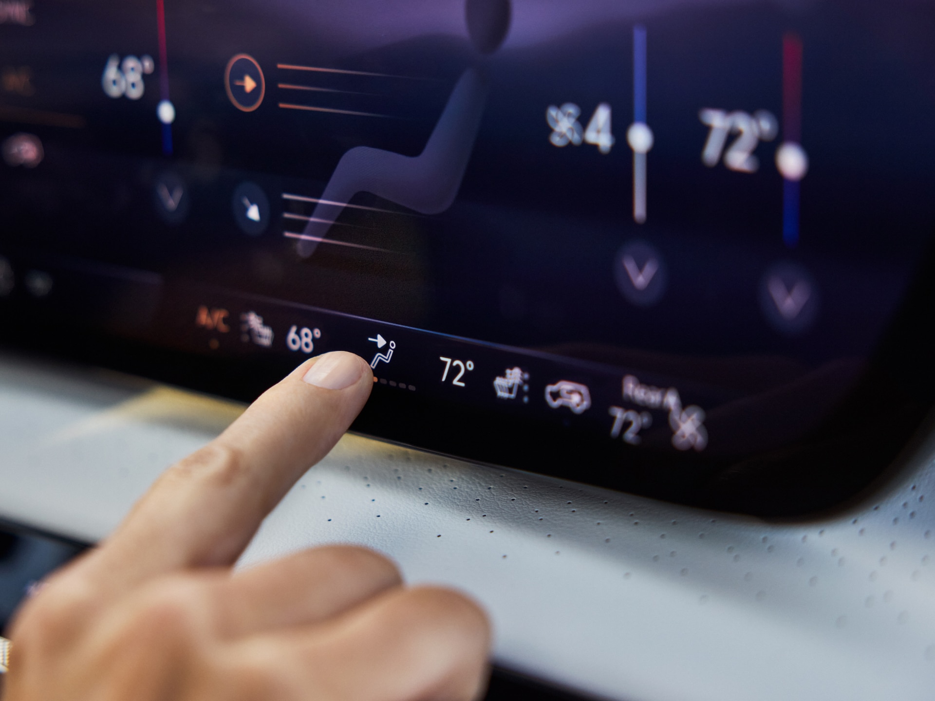 A Finger Adjusting the Digital Climate Control Screen in a Buick Vehicle with Temperatures Displayed