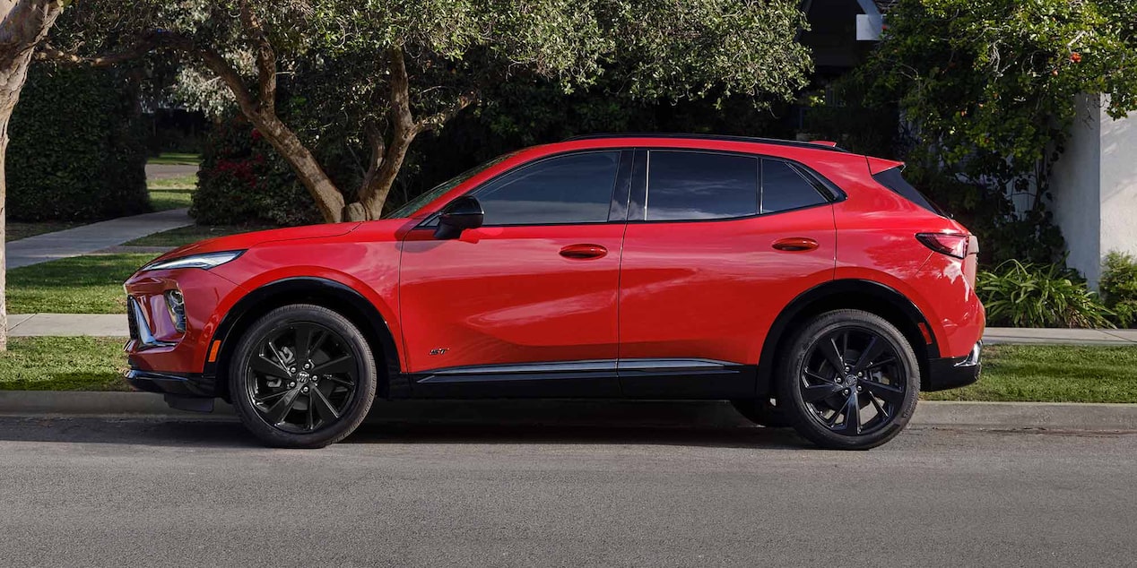 A Side-By-Side Comparison of a Blue Buick Envista and a Gray Buick Encore GX Both Displaying Their Side Profiles 