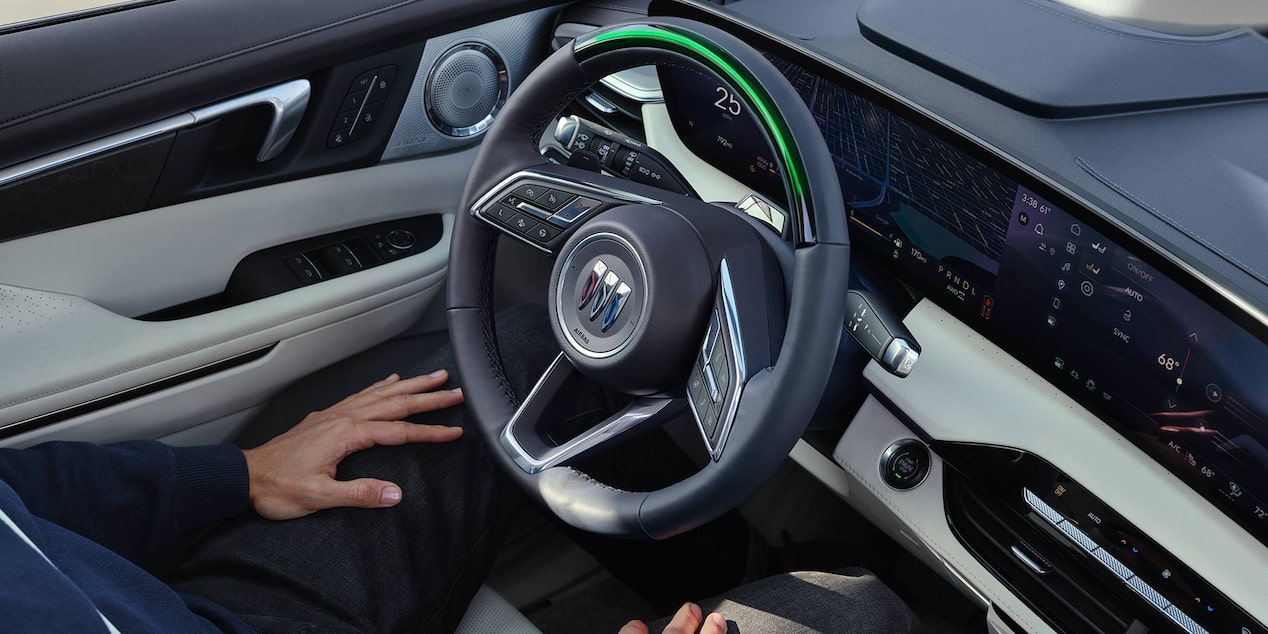 Close-up of a Buick Steering Wheel and Dashboard Displaying Super Cruise Hands-Free Driving Technology