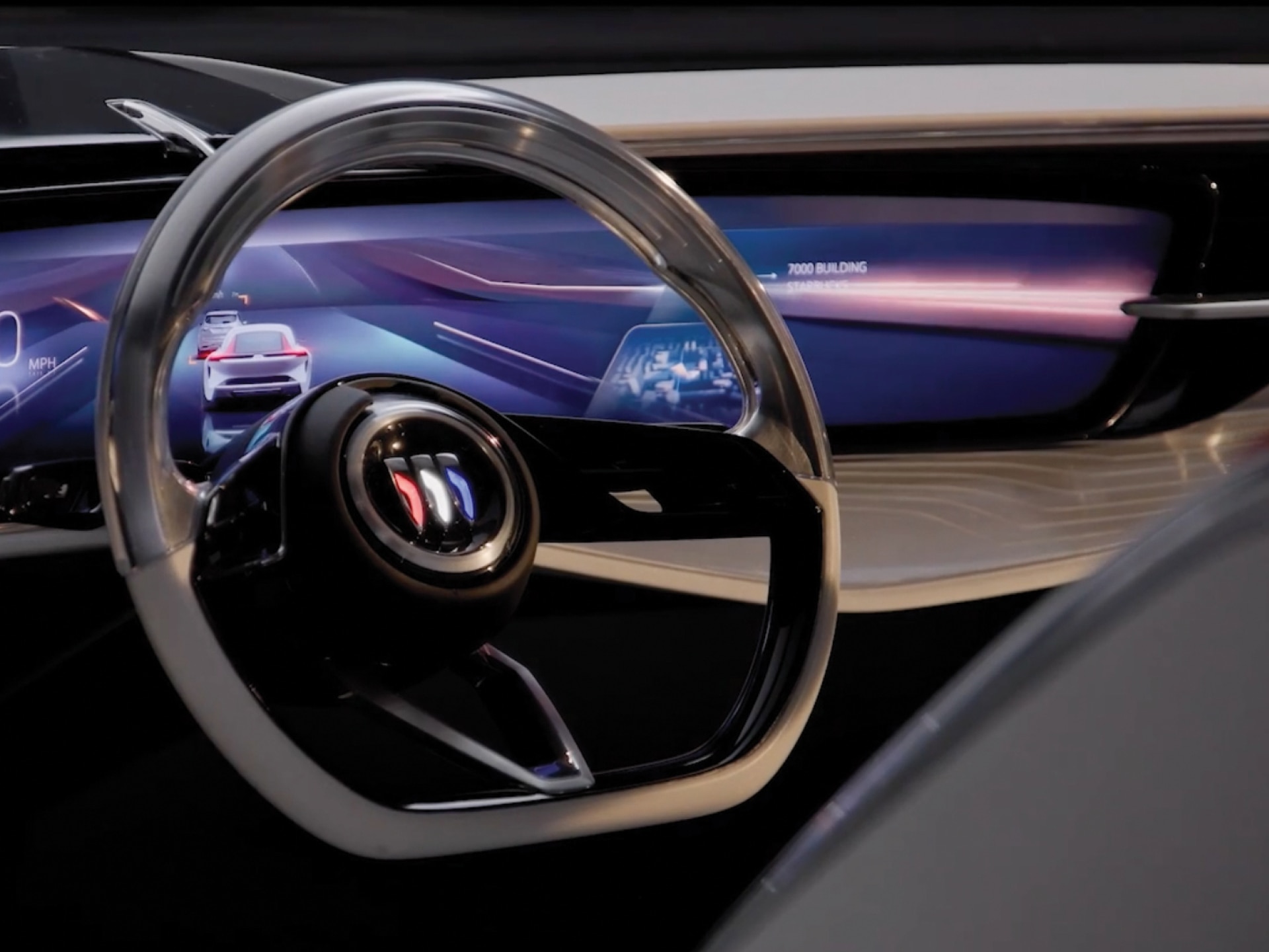 Interior View of a Futuristic Buick Vehicle's Steering Wheel and Digital Dashboard