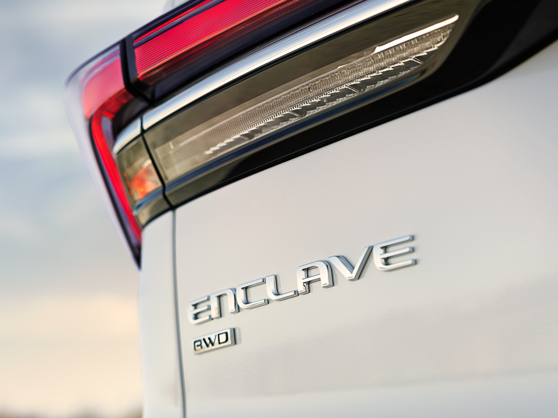 Close-up of a Red Taillight and AWD Badge of a 2025 Buick Enclave
