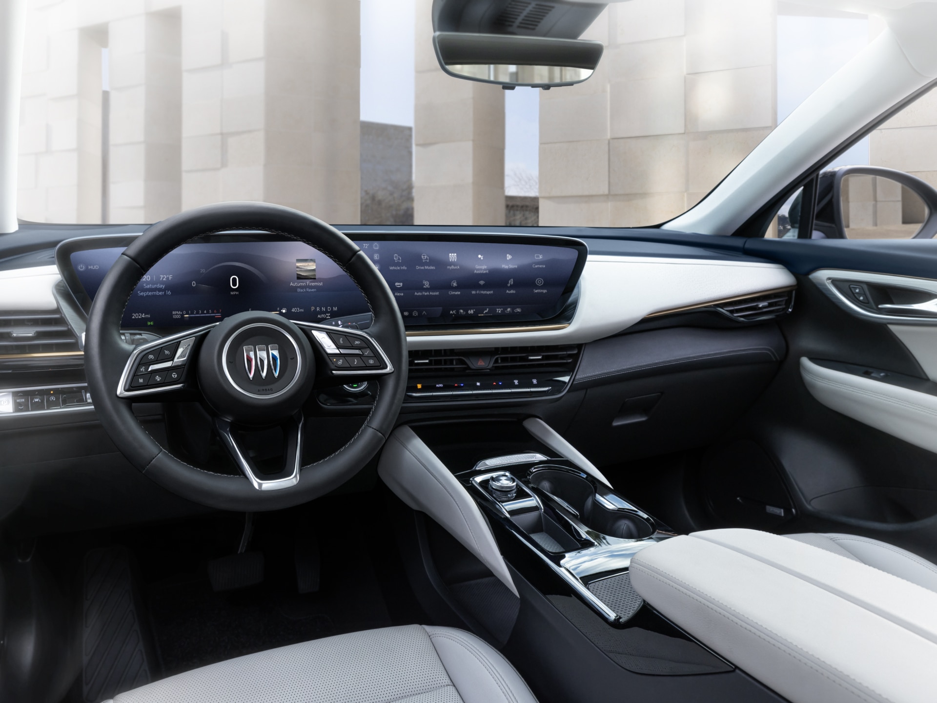View From the Driver's Seat of a Buicks Interior Dashboard and Steering Wheel