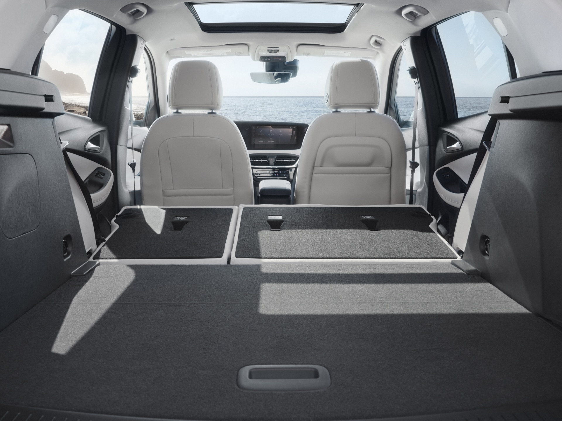 Interior View of the Rear Seats Folded Down to Show the Spacious Cargo Volume in the Buick Encore GX
