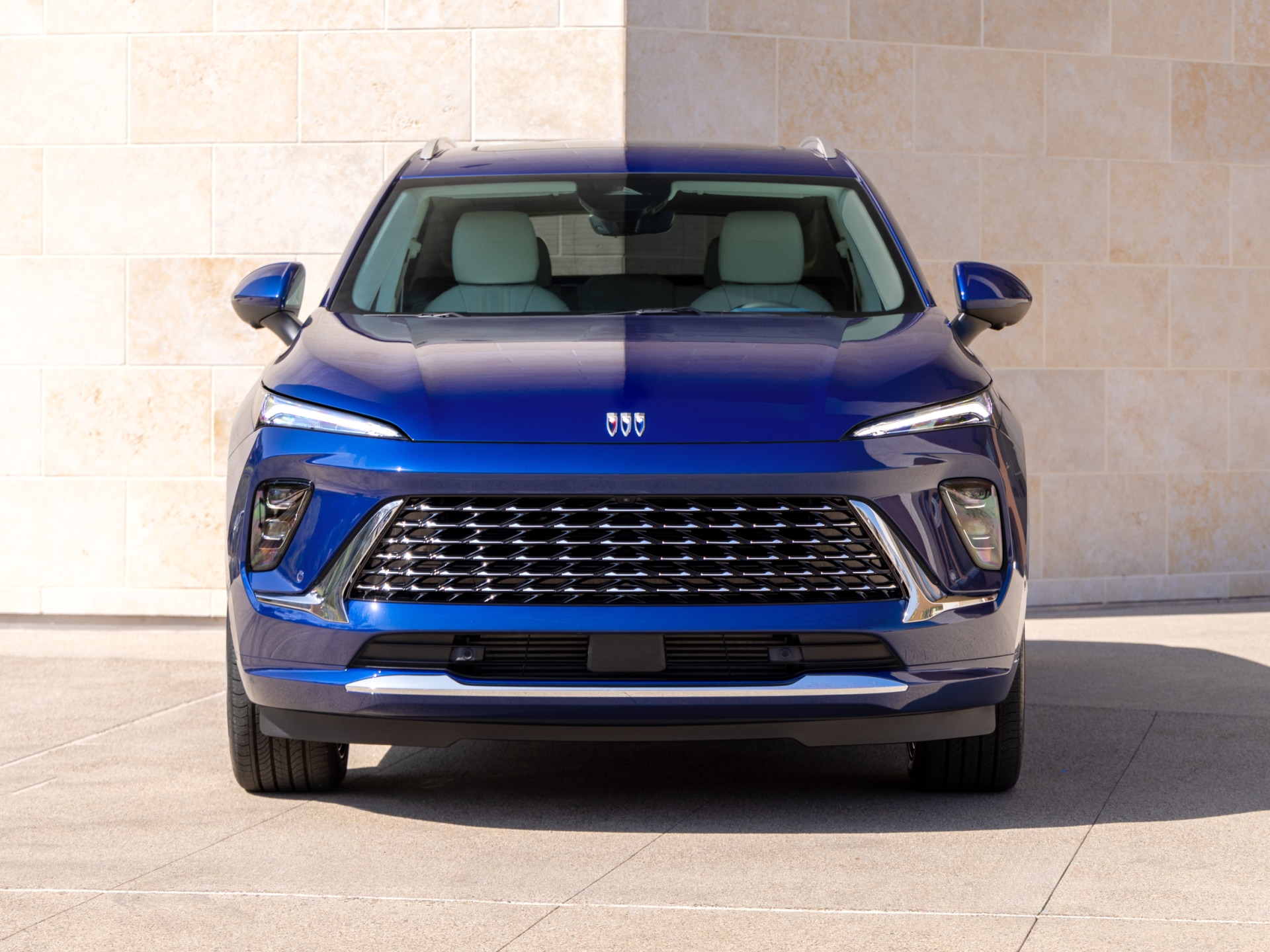 Front View of a Blue Buick Enclave Mid-Size SUV