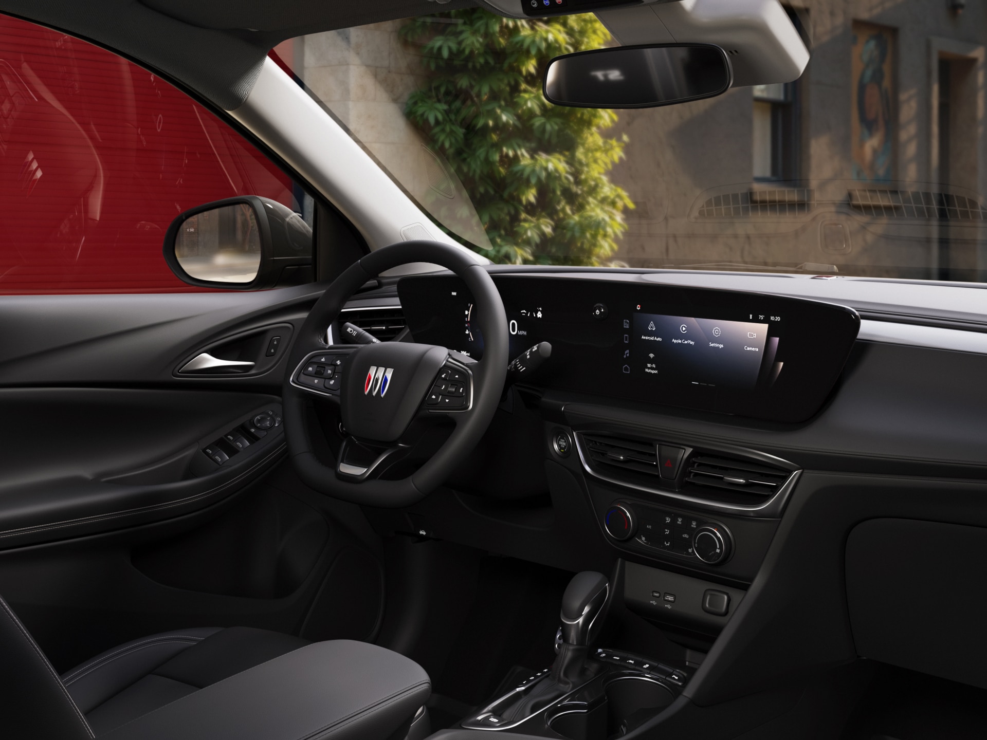 The Interior Dashboard View from the Passenger Seat of the 2026 Encore GX ST SUV with the Studio Series Package