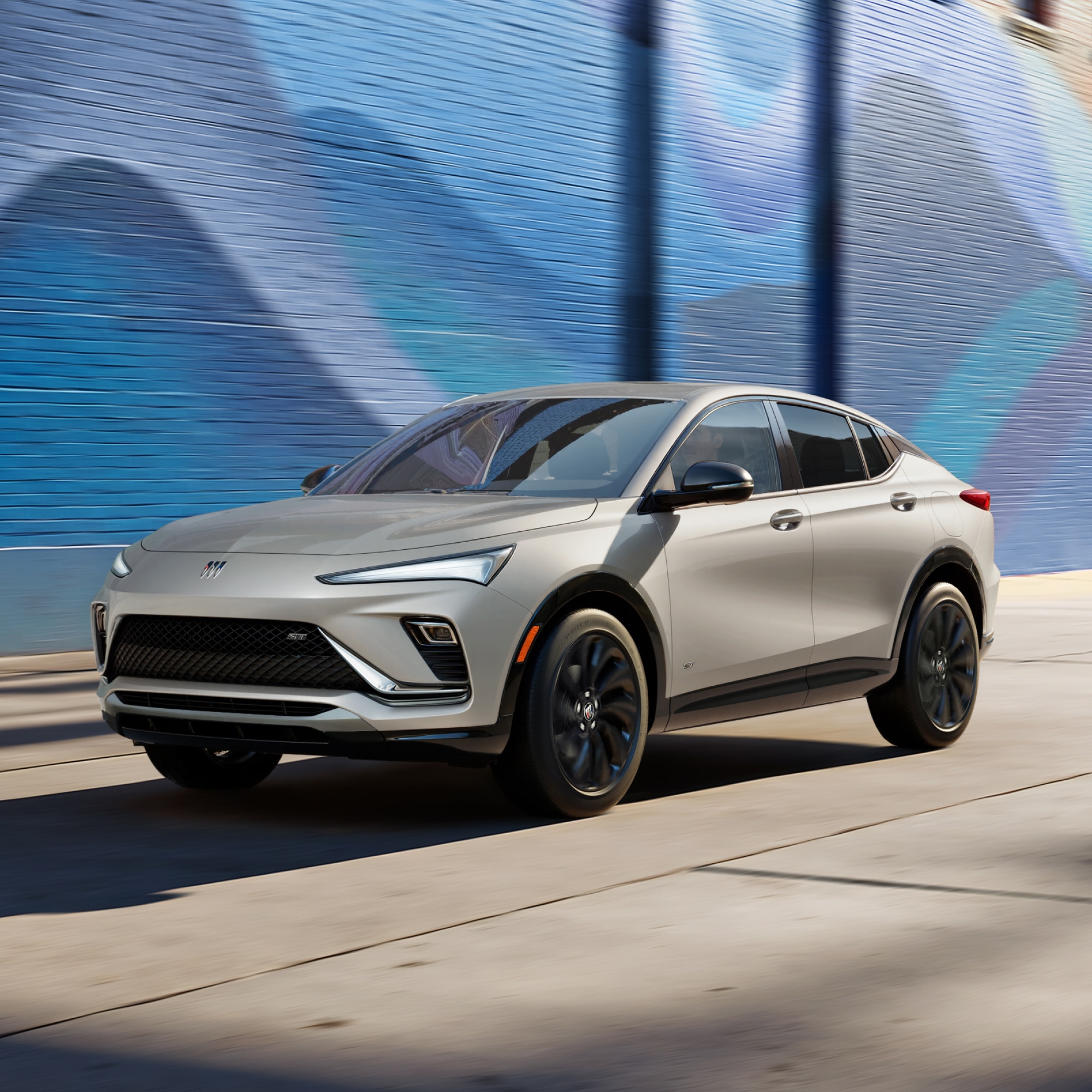Front View of the 2026 Envista ST SUV Driving Down a City Steet
