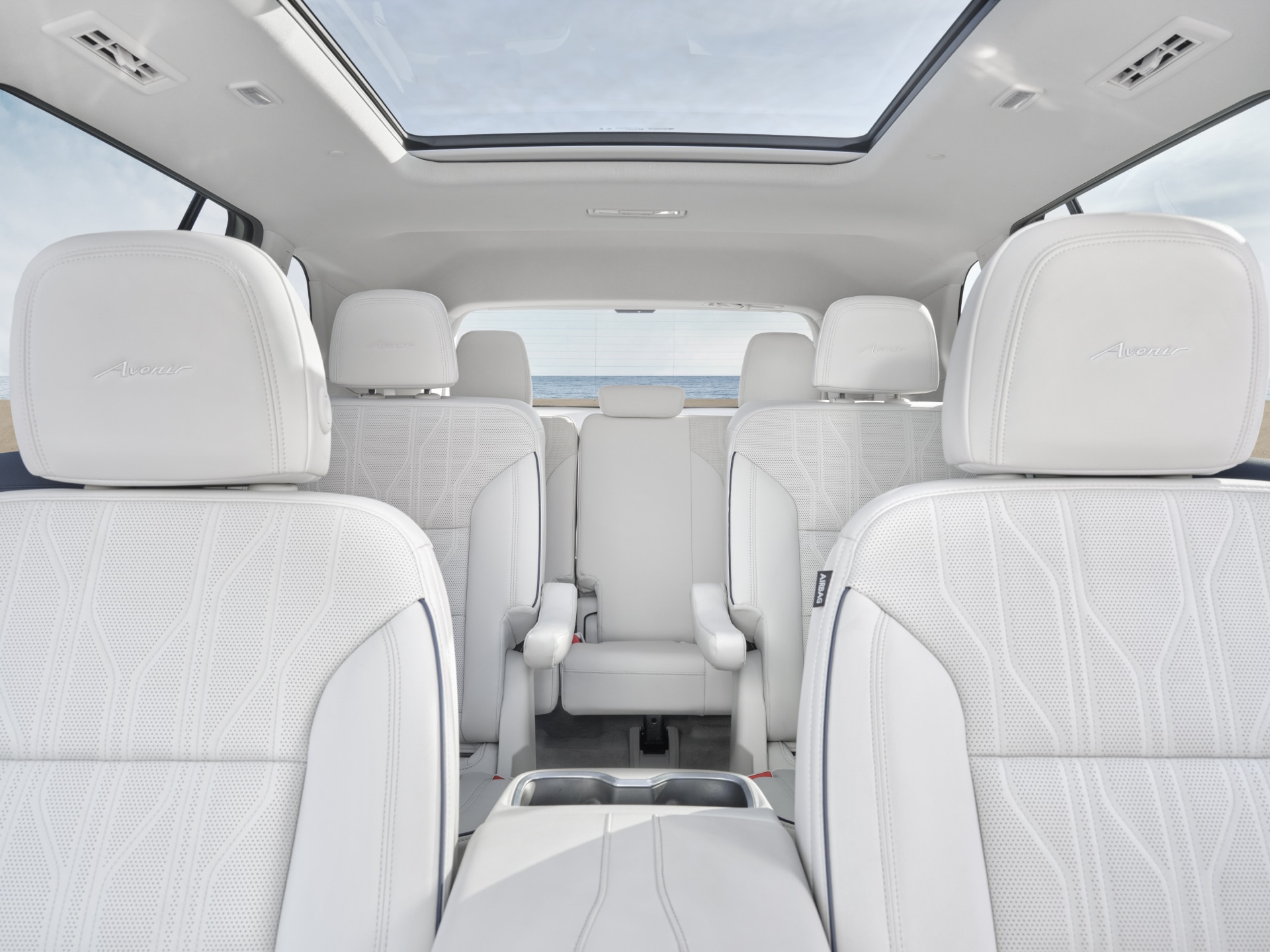 Interior View of the White Interior Seating in the Buick Enclave Avenir Luxury Mid-Size SUV Displaying the Seating Capacity