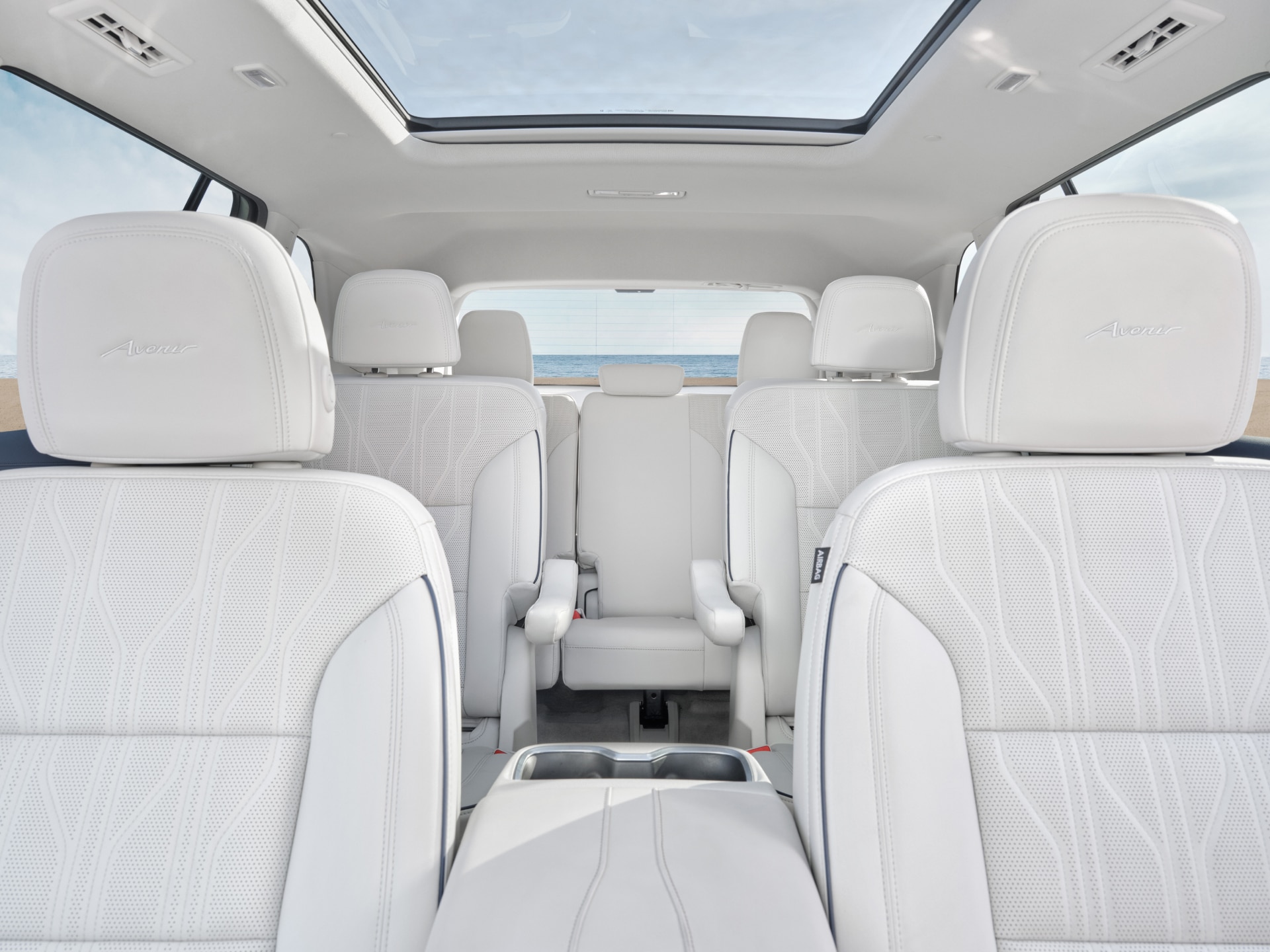 A Backward Facing View of the White Leather Seats in a Buick Enclave Avenir