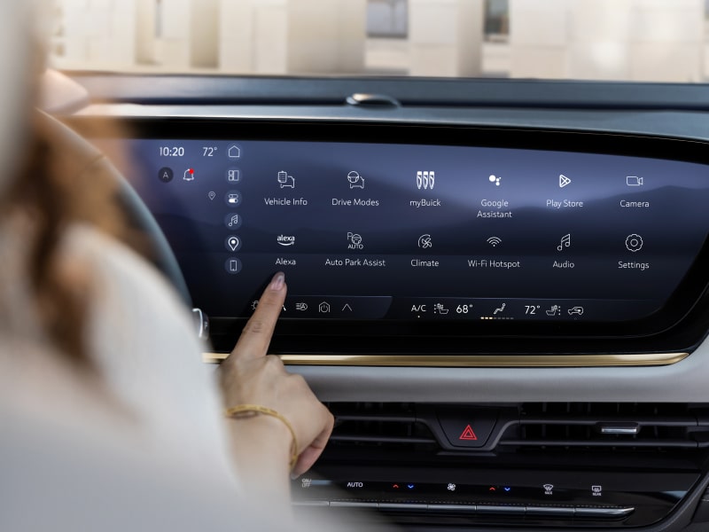 Close-up of a Woman Using the Touch Screen on the Buick Infotainment Screen