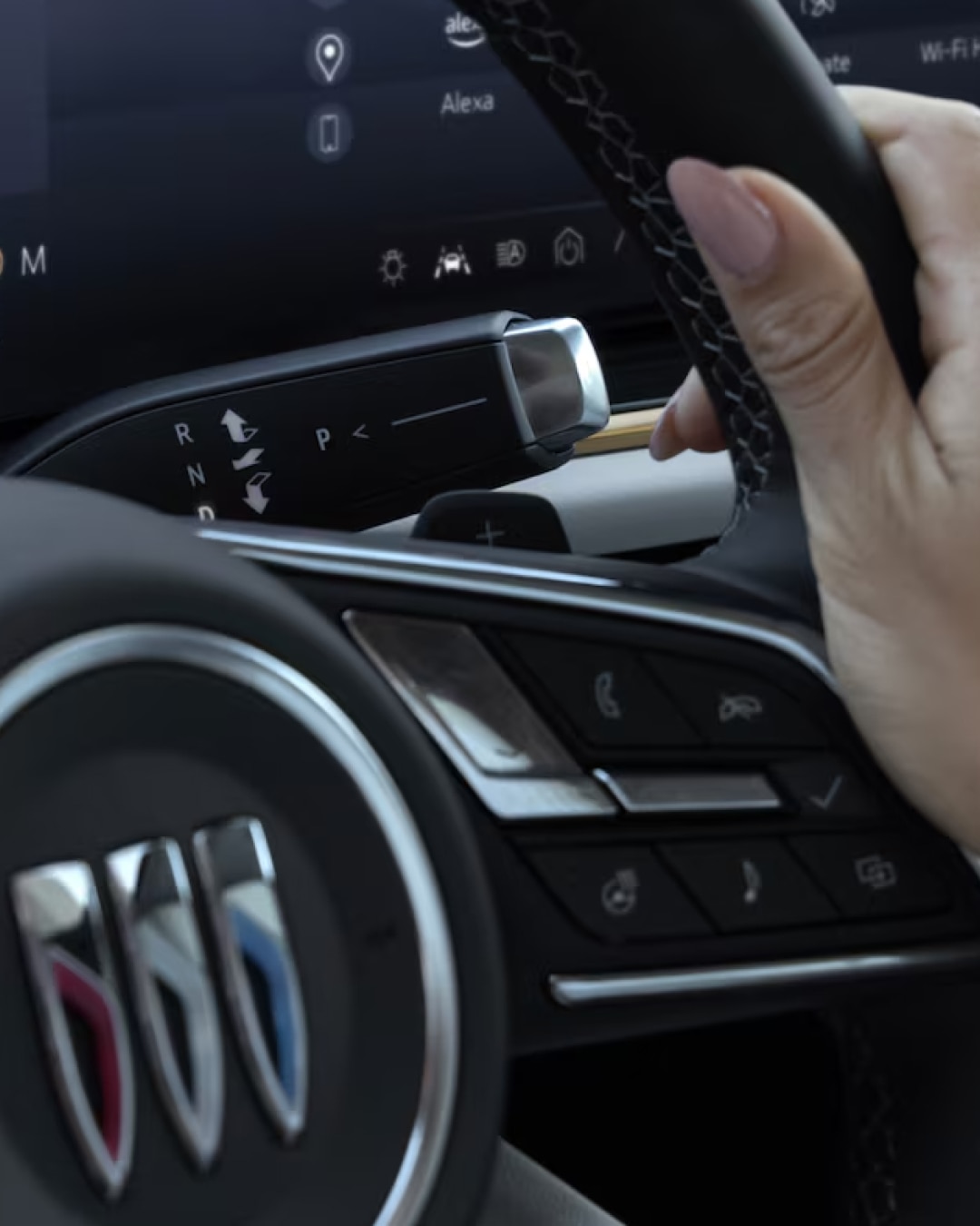 Close-up of a Woman's Hands on the Buick Steering Wheel