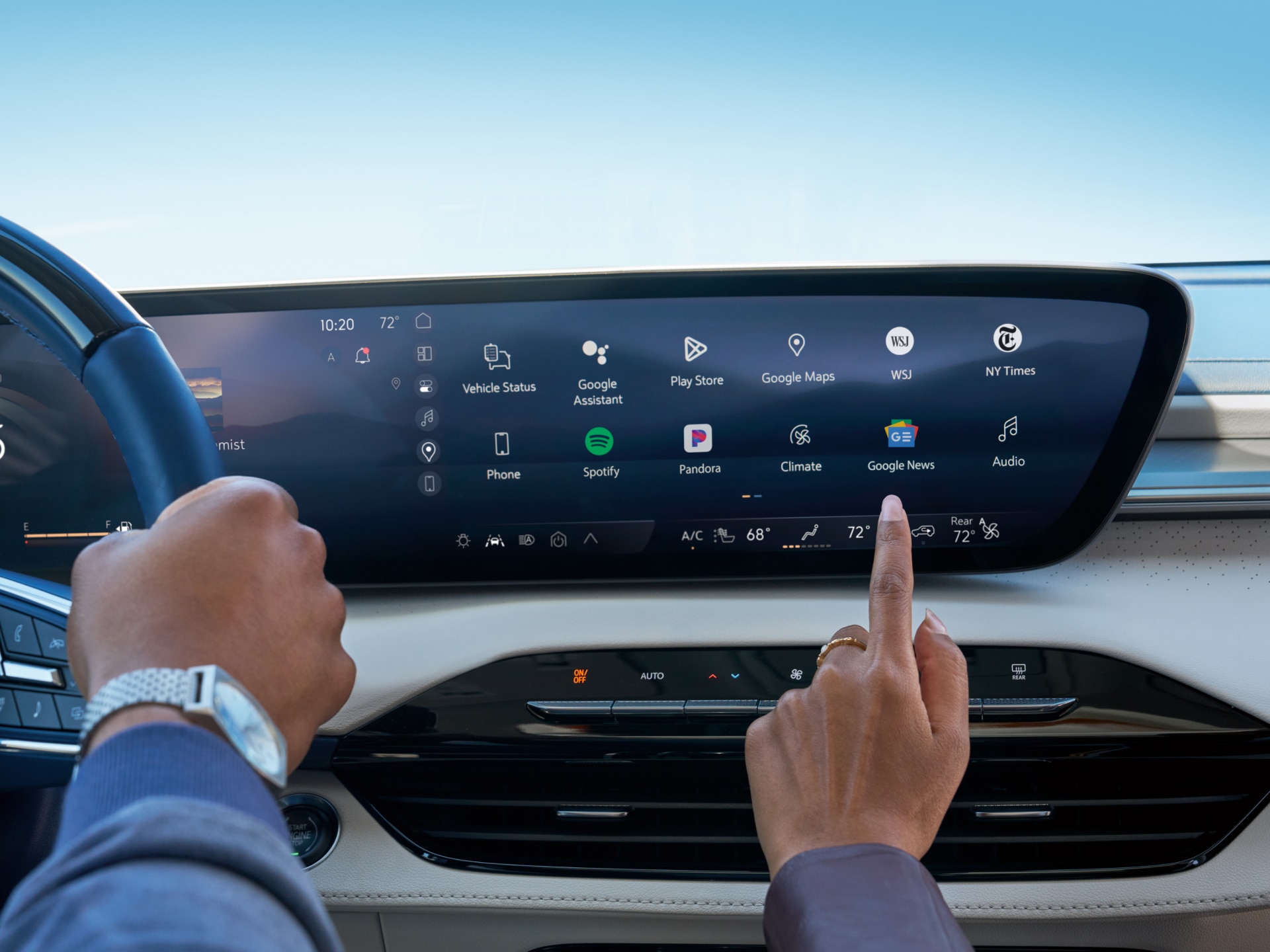 Close-up of a Woman Using the Touch Screen on the Buick Infotainment Screen