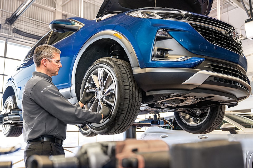Buick Vehicle Being Worked on by a Certified Service Technician