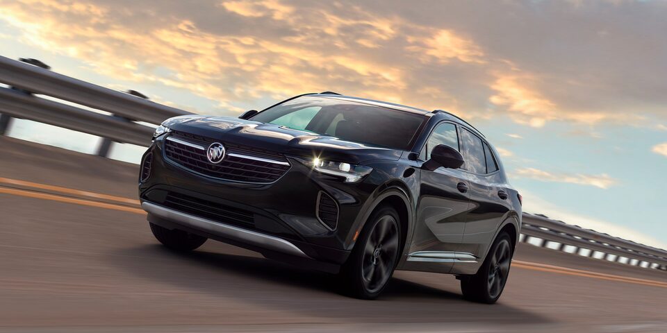 Closeup of a Buick SUV Driving Down a Road