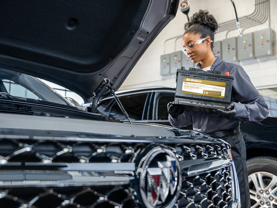 Buick Certified Service Technician Working on a Buick Vehicle