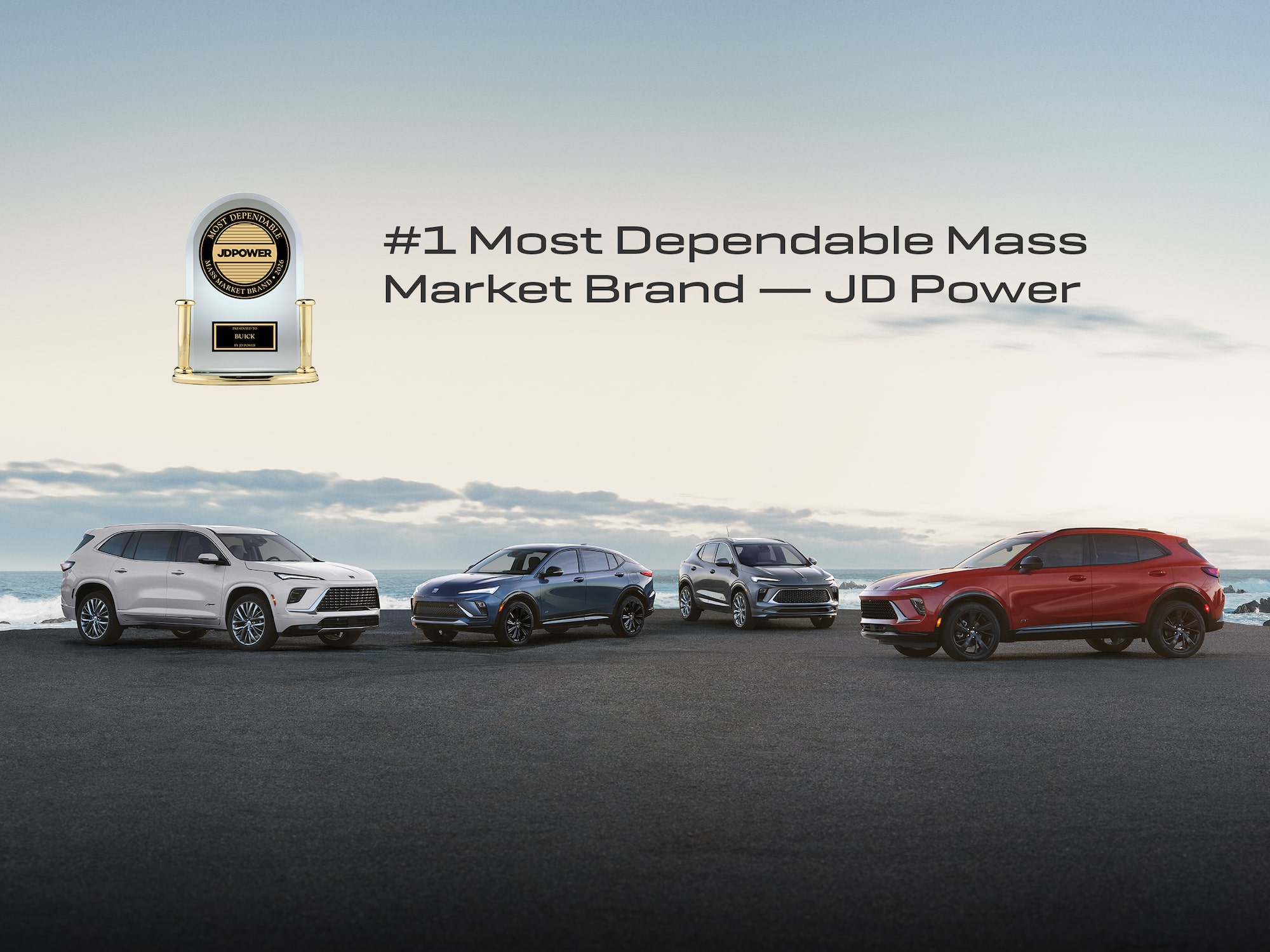 Four Buick Vehicles, a White Envista, a Dark Blue Envista, a Gray Envision, and a Red Encore GX, Parked along a Waterfront with Two JD Power Awards for Buick with text overlay:  "#1 for Sales Satisfaction and Dependability among Mass Market Brands"