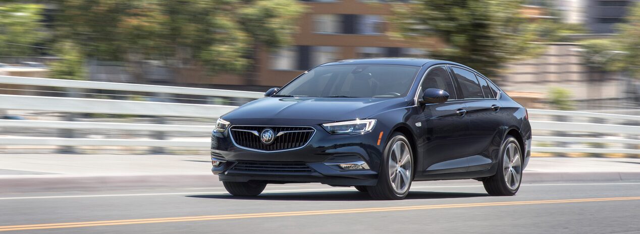 Choose Your Regal Sportback Gs Tourx Buick Luxury Cars Photo Showing The 2018 Buick Regal Sportback Luxury Sedan Driving On Road