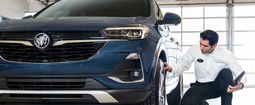 Buick Certified Service Technician Replacing Vehicle’s Tire
