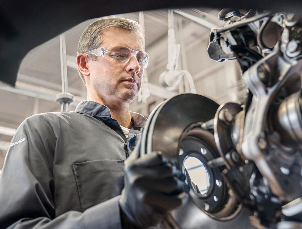Buick service professional repairing vehicle