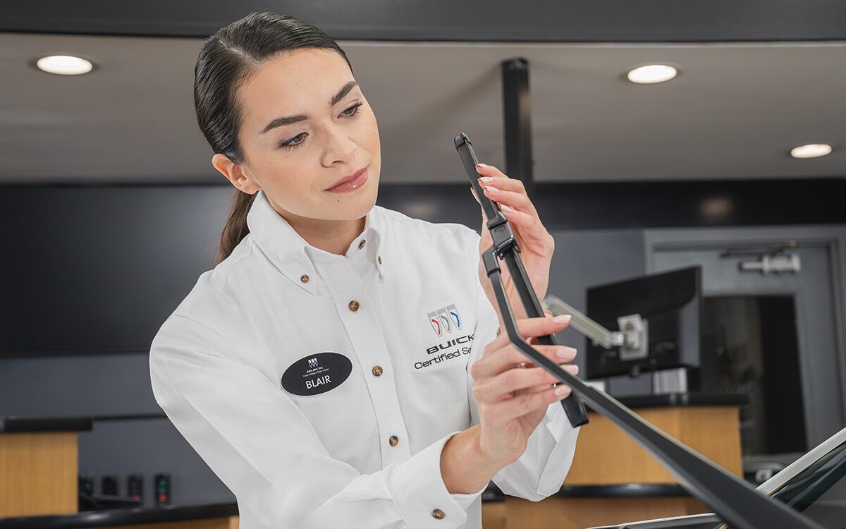 A Buick Certified Service Technician Inspecting Wipers