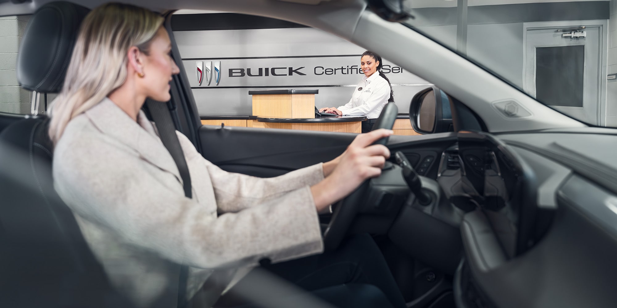 Customer sitting in her Buick vehicle