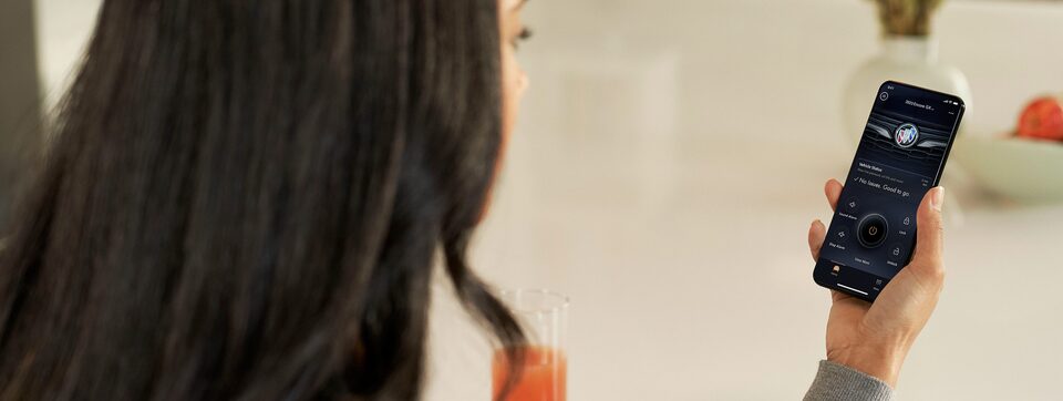 Women Utilizing the MyBuick App on her Smartphone