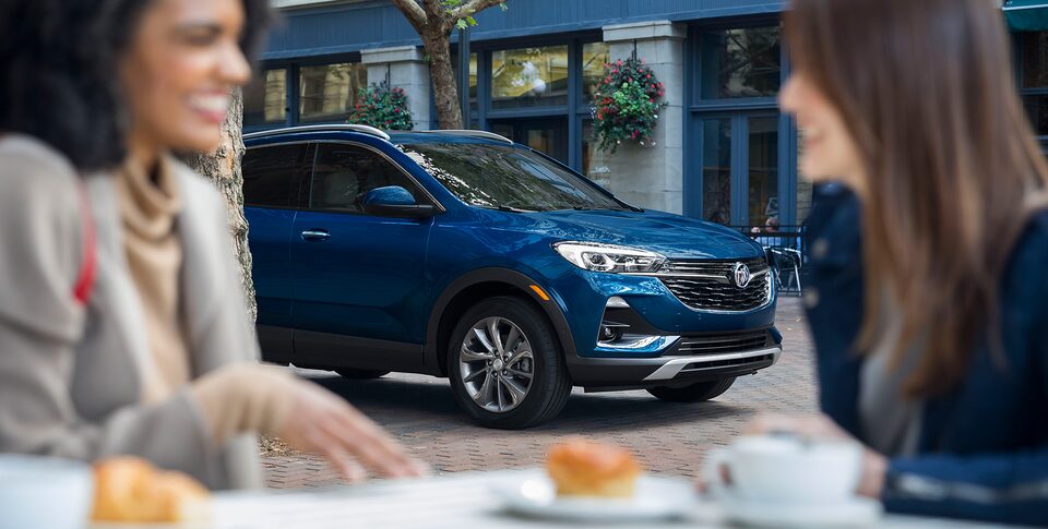 Image of someone using the myBuick app on their smartphone to lock their Buick vehicle.