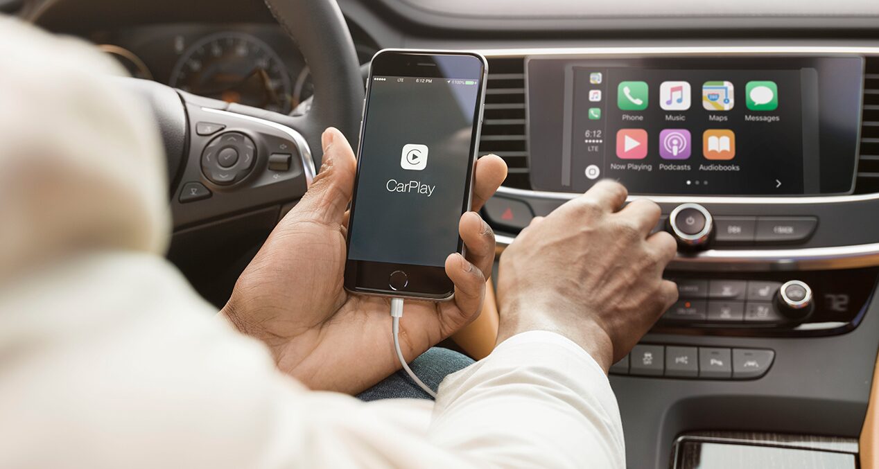 Closeup image of the color touch display in a Buick vehicle using the  navigation features.