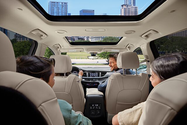 A Family of Four Enjoys the Spacious and Luxurious of Their Buick SUV