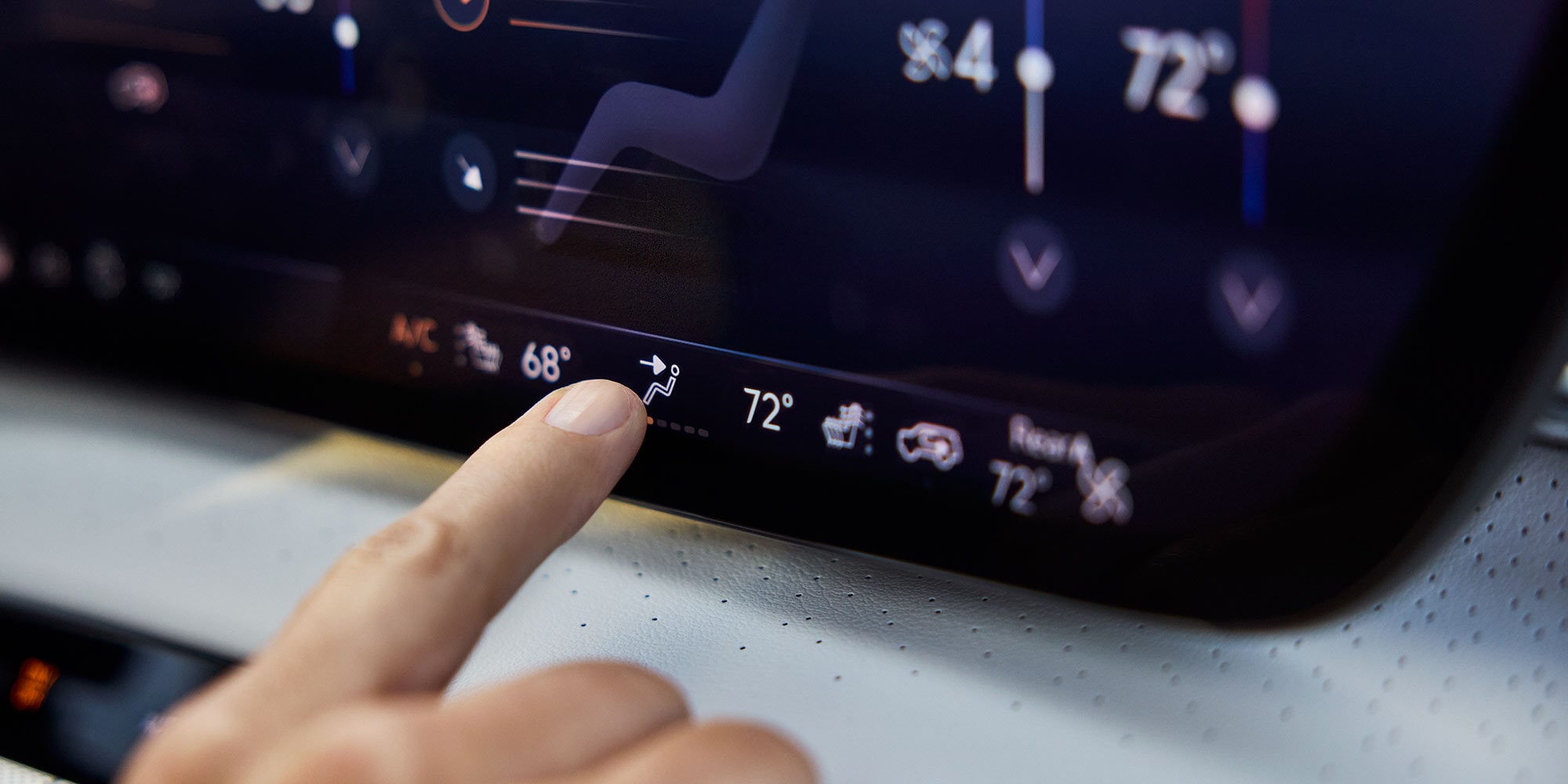 A Finger Adjusting the Digital Climate Control Screen in a Buick Vehicle with Temperatures Displayed