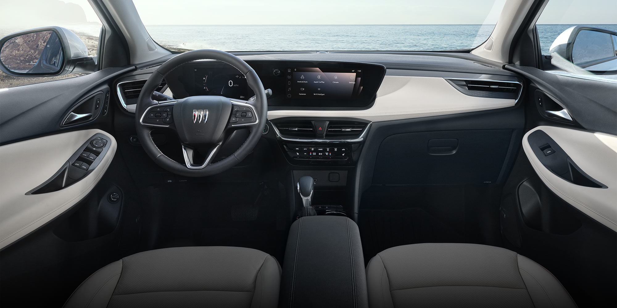 The Interior of a Buick 2026 Encore GX With the Ocean Visible Through the Windshield