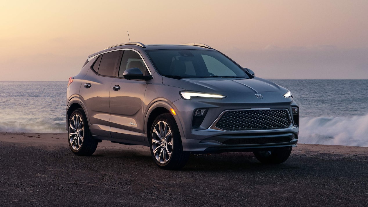 Front Three-Quarters View of the Buick Encore GX Parked on the Beach at Sunset