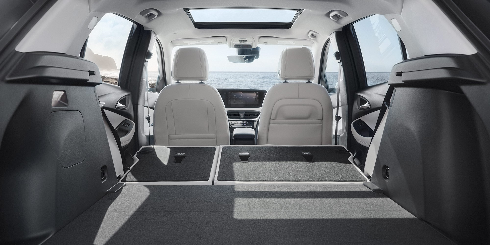 Interior View of the Rear Seats Folded Down to Show the Spacious Cargo Volume in the Buick Encore GX