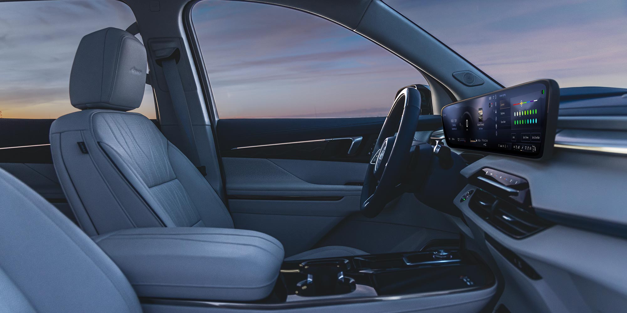 The Luxurious Interior of a Buick Vehicle with Beige Seating and a Sunset Sky