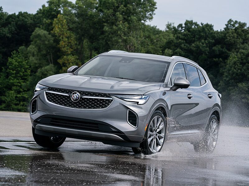 A Buick SUV Speeding on an Open Country Road