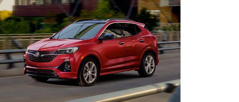 The Buick Encore GX Speeds Over a Bridge in the City