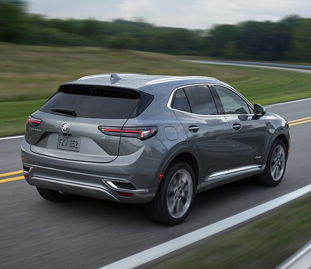 A Buick SUV Speeding on an Open Country Road